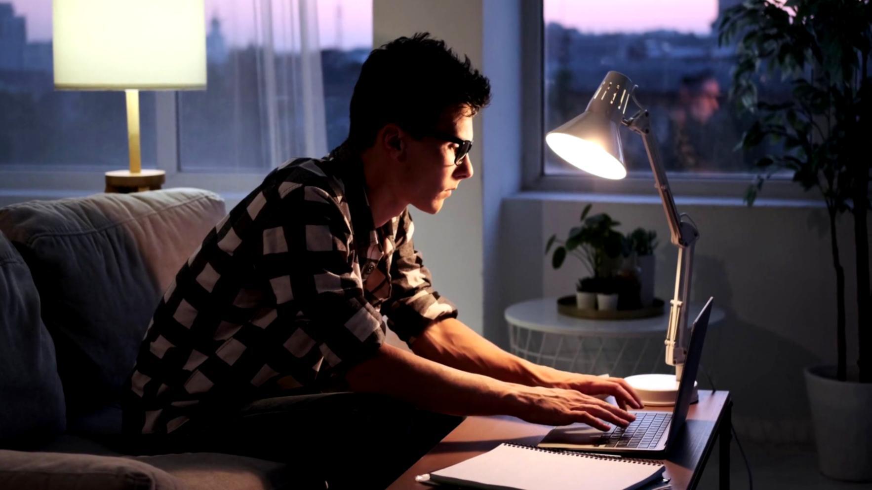 Collaborative workspace with students working on digital commerce projects